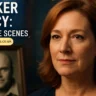 Danna Lynn Blocker in sharp focus with a subtle framed photo of Dan Blocker in the background