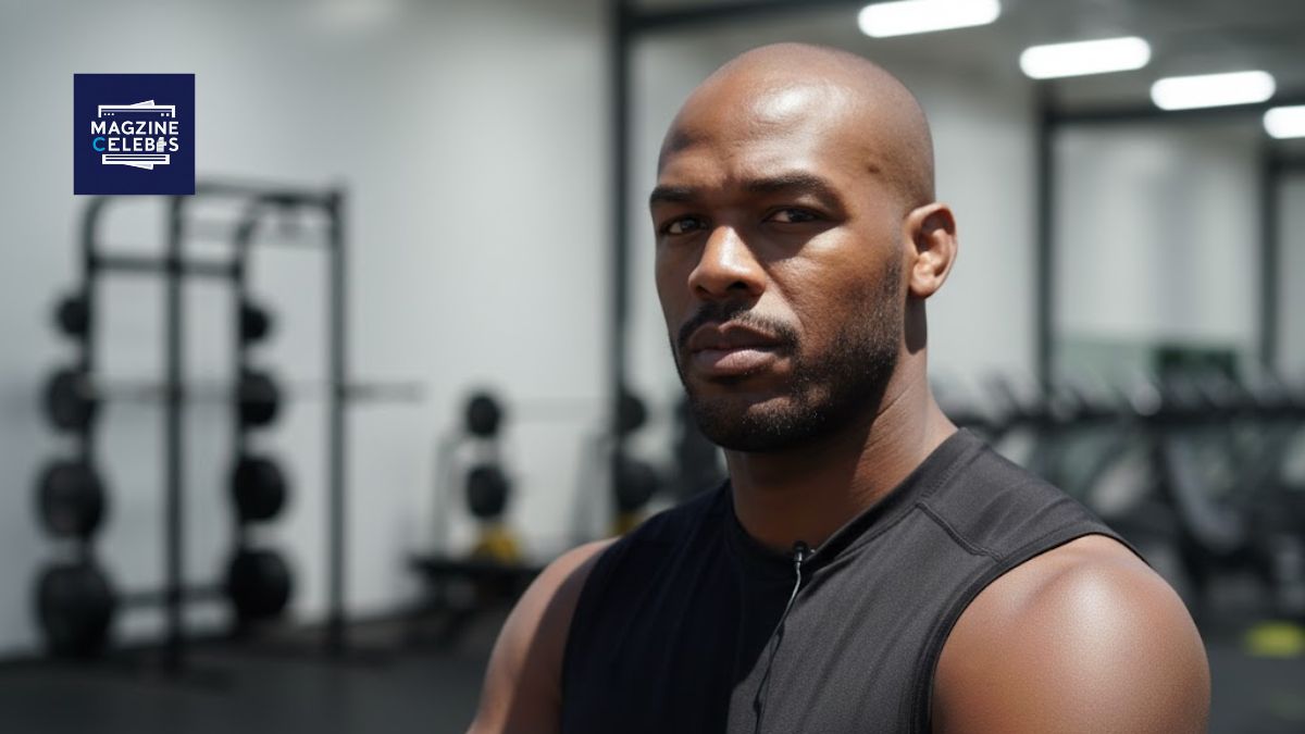 Jon Jones posing confidently in a gym wearing black training gear — UFC champion and MMA legend