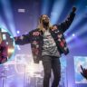 Lil Durk performing live on stage 2025 with inset of Lil Durk in purple outfit – MagzineCelebs