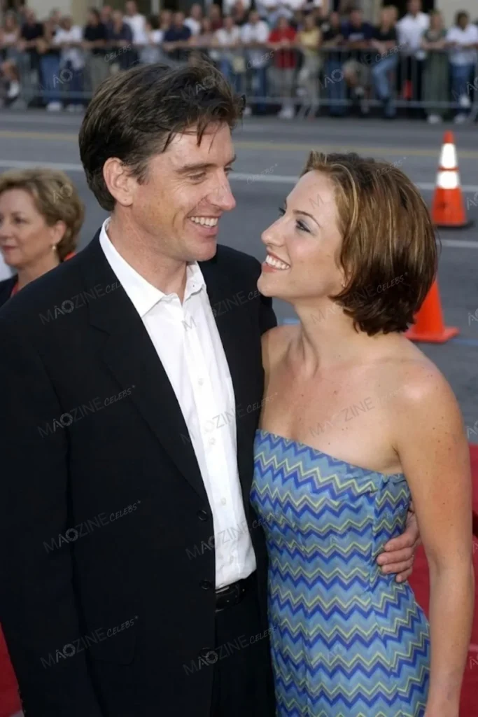 Craig Ferguson looking admiringly at his wife Sascha Corwin while she smiles at him.