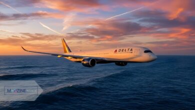 (Why Was delta flight dl275 diverted lax ) Delta Air Lines Airbus A350-900 aircraft flying over the ocean during a dramatic sunset.