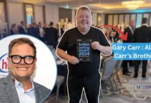 A collage image showing comedian Alan Carr on the left and his brother Gary Carr on the right. Gary is holding a 'British Parking Awards 2024' booklet, highlighting his separate career in business. Text overlay reads: Gary Carr: Alan Carr's Brother.