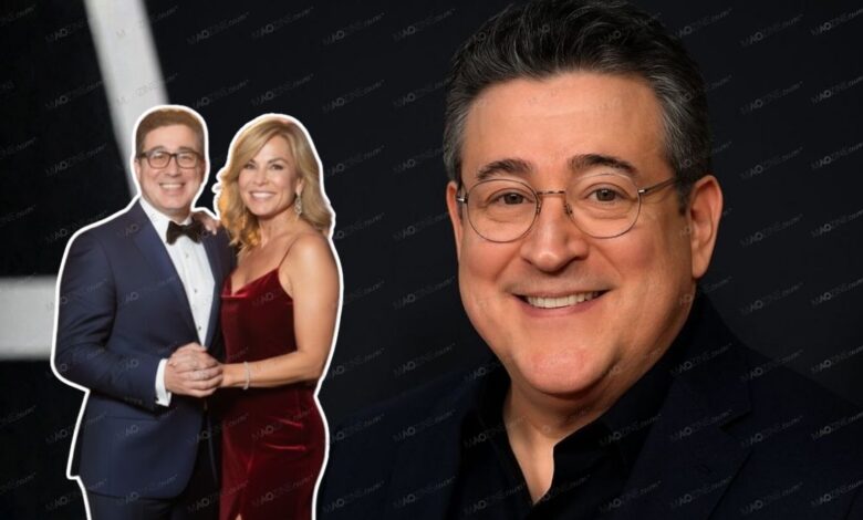 Itchko Ezratti and his wife Anna Ezratti smiling together at a formal event