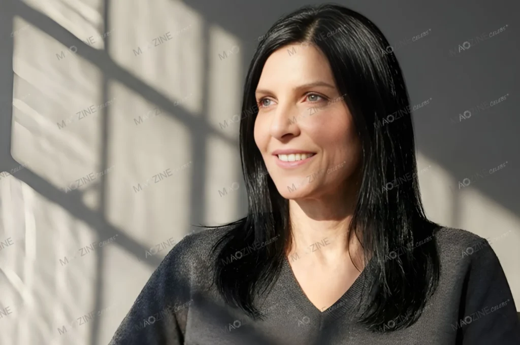 Close-up portrait of former Italian model Margherita Ronchi smiling naturally.