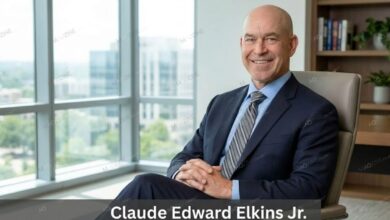 Claude Edward Elkins Jr (Ed Elkins), Executive Vice President & Chief Marketing Officer at Norfolk Southern, sitting in a corporate office.