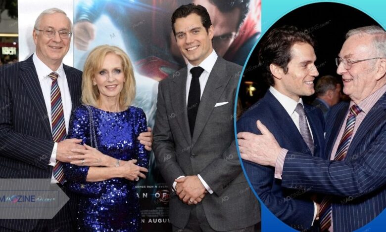 Colin Cavill standing with wife Marianne and son Henry Cavill at a red carpet premiere, featuring a candid moment of father and son laughing together.