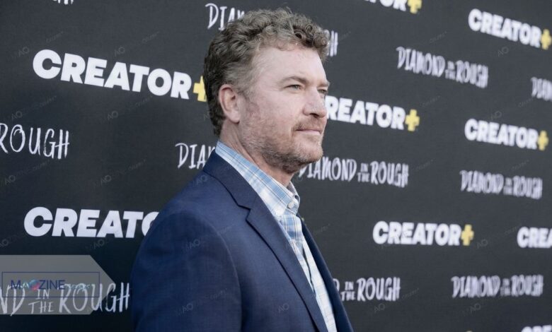 Pat Finn actor known for Toyota commercials and The Middle posing on the red carpet at a Creator+ movie premiere.