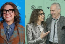 Rebecca Miller smiling with her husband Daniel Day-Lewis at a film event