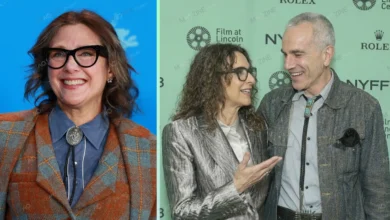 Rebecca Miller smiling with her husband Daniel Day-Lewis at a film event