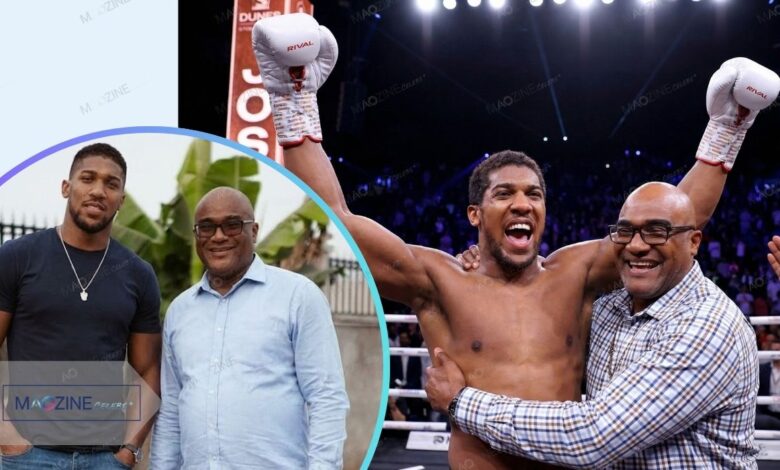 Robert Joshua hugging his son Anthony Joshua tightly inside the boxing ring after a championship victory.