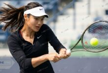 Emma Raducanu hitting a powerful two-handed backhand during Australian Open 2026 training session.