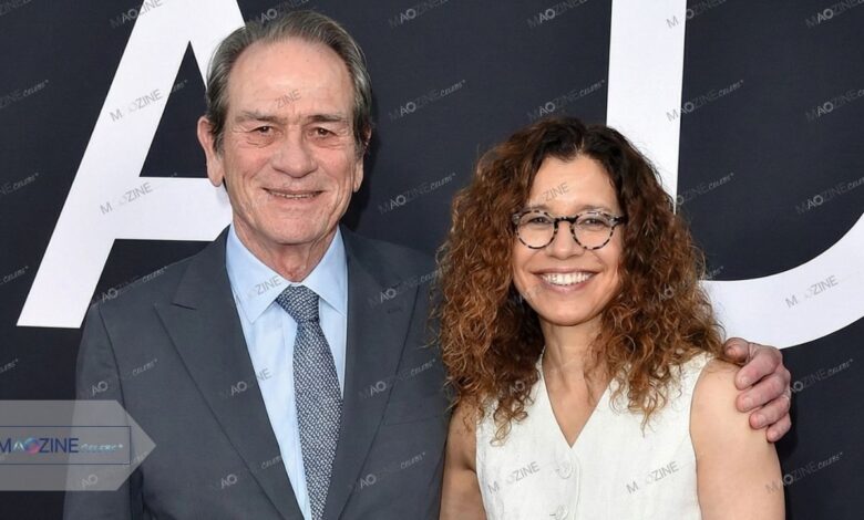 Dawn Laurel-Jones and Tommy Lee Jones attending a red carpet event.