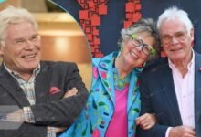 John Playfair (Prue Leith’s Husband) wearing colourful fashion glasses and blue jacket alongside wife Prue Leith.