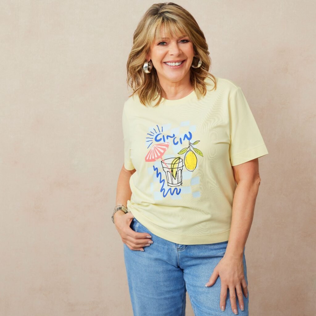 A woman wearing t-shirt and jeans, mainly y2k fashion.